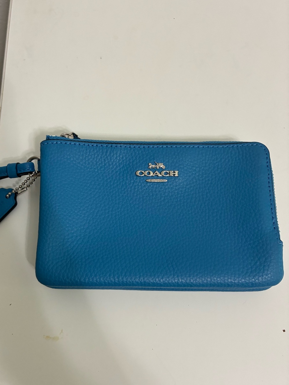 COACH Bright Blue Pebbled Leather Zip Wristlet 6 1/4 x 4”
